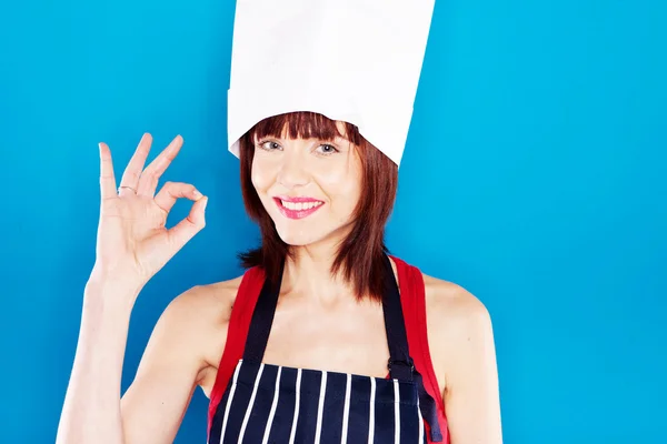 Усміхаючись шеф-кухаря, даючи досконалості жест — стокове фото