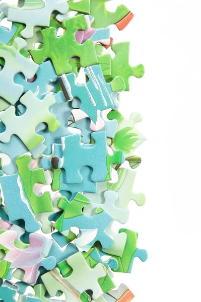 A különböző alakzatokat színes puzzle — Stock Fotó