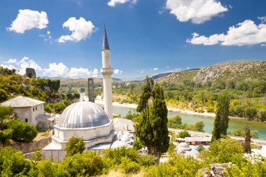 Mosque - Pocitelj and in background Neretva river. clipart