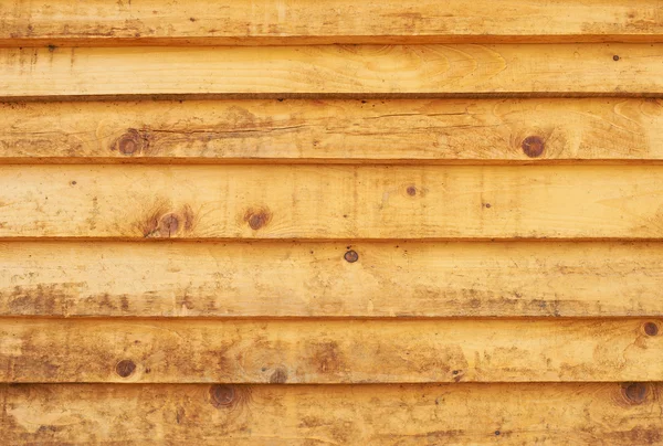 Textura de madeira amarela com padrões naturais — Fotografia de Stock