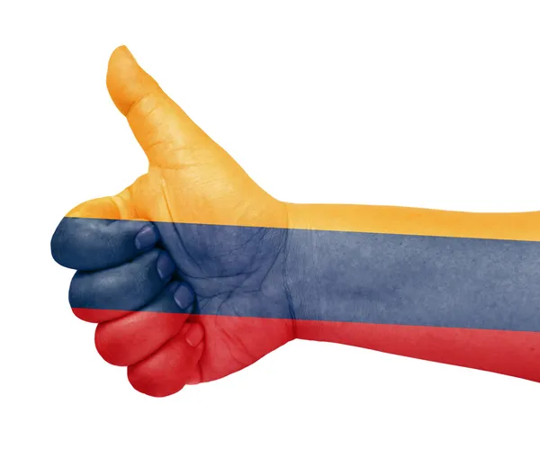 Прапор Колумбії на великий палець вгору жестом як значок — стокове фото