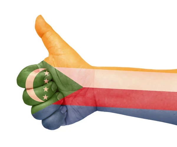 Bandera de las Comoras en el pulgar hacia arriba gesto como icono —  Fotos de Stock