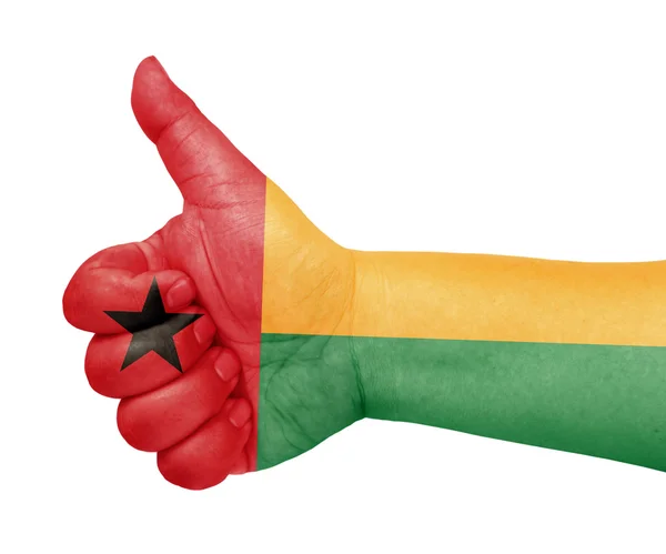 Bandera de Guinea-Bissau en el pulgar hacia arriba gesto como icono — Foto de Stock
