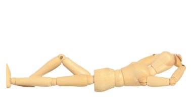 Yellow wooden dummy in lay sleep action clipart