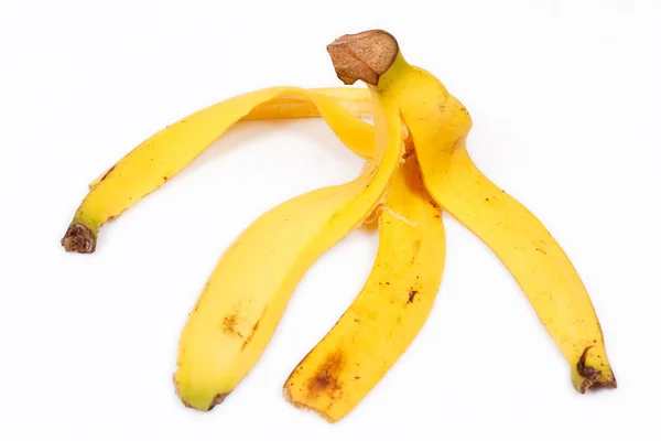 白地に隔離されたバナナの皮 — ストック写真