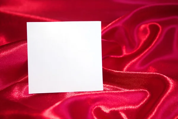 Sign for the label sheet of white paper with a red background — Stock Photo, Image