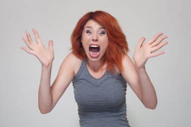 Portrait of young surprised girl clipart