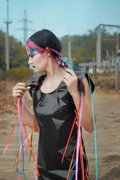 Futuristisches Mädchen im schwarzen PVC-Kleid — Stockfoto