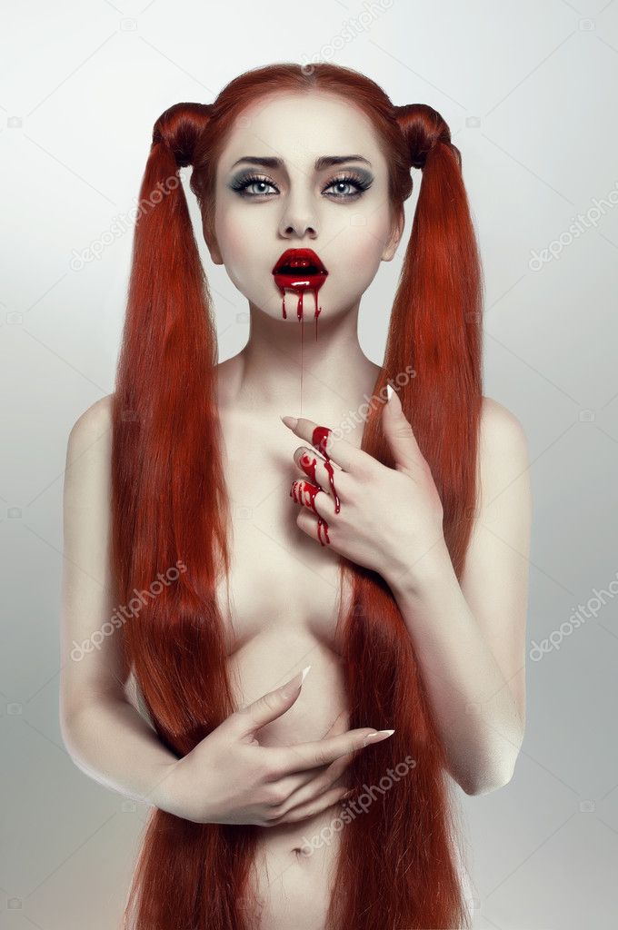 Beautiful redhead bleeding woman