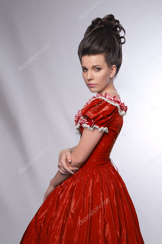 Old fashioned girl in red dress