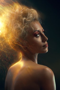 Portrait of a blond with burning hair clipart