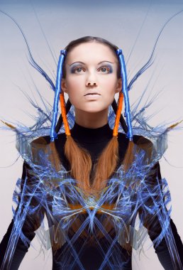 Futuristic girl with blue and orange energy flows. Art concept clipart