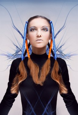 Futuristic girl with blue and orange energy flows. Art concept clipart