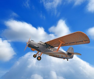Gökyüzünde eski çift kanatlı uçak