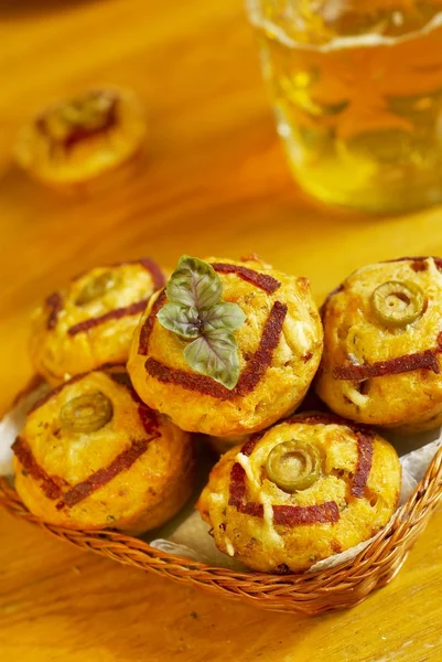 Muffins with salami and olives — Stock Photo, Image