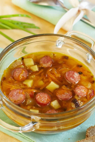 Potato soup with smoked sausages — Stock Photo, Image