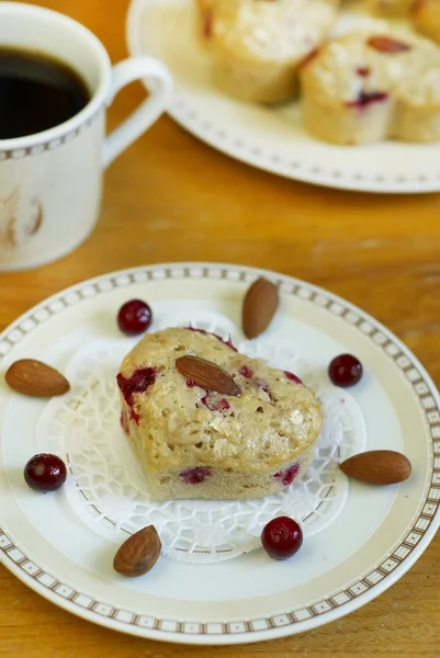 Muffins with almonds and cowberries in Valentine day — Stock Photo, Image