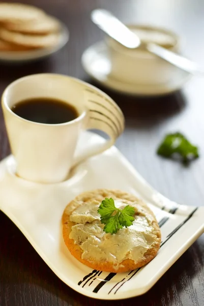 Crackers with herring butter and coffee for breakfast — Stock Photo, Image