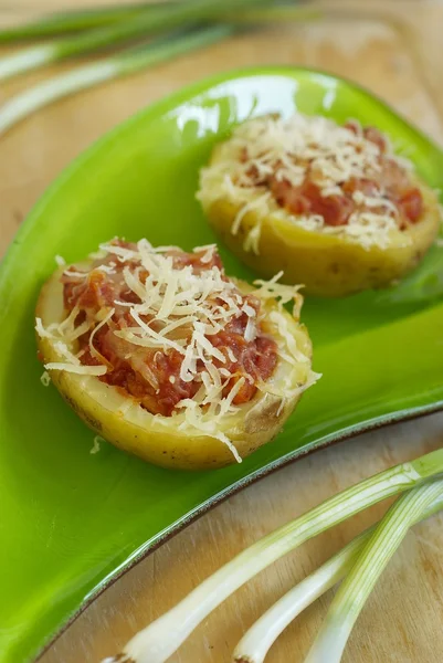 Potato stuffed with forcemeat and cheese — Stock Photo, Image