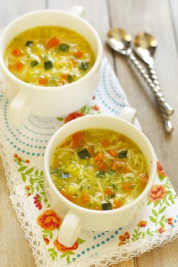 Vegetable soup with noodles clipart