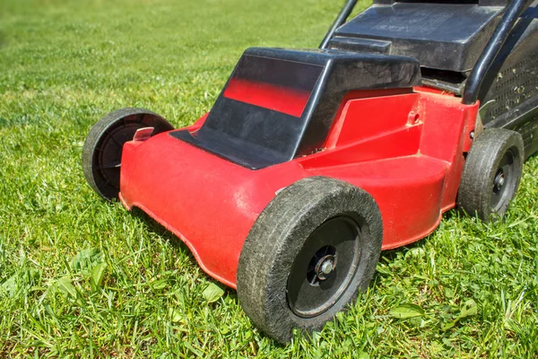 Lawnmower on grass — Stock Photo, Image