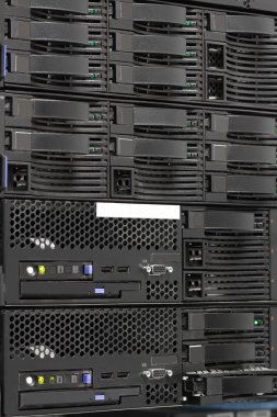 Servers stack with hard drives in a datacenter clipart