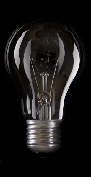 Electric Bulb isolated black background — Stock Photo, Image