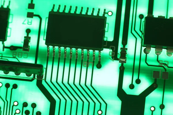 Fondo de tecnología electrónica en verde — Foto de Stock