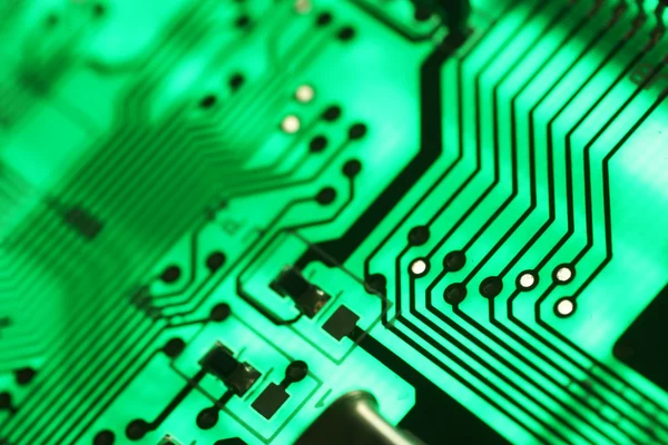 Elektronica technologie achtergrond in het groen — Stockfoto