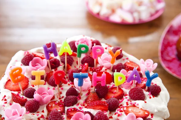 Colorful birthday cake with letters — Stock Photo, Image