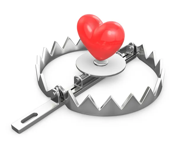 Red heart in a bear trap — Stock Photo, Image