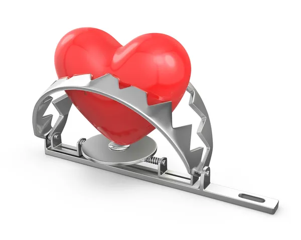 Red heart caught in a trap — Stock Photo, Image