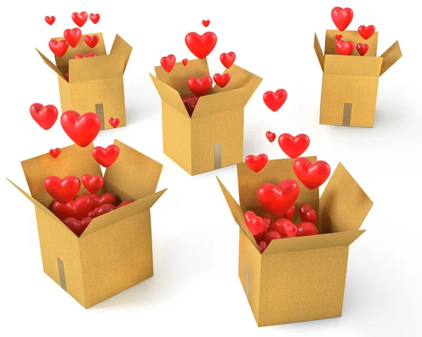 Um monte de caixas de cartão com corações vermelhos voando para fora deles — Fotografia de Stock