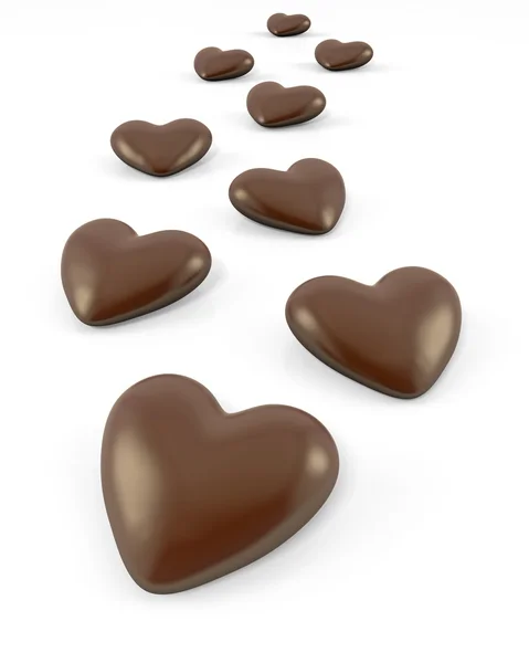 Wenige herzförmige Schokoladenbonbons — Stockfoto