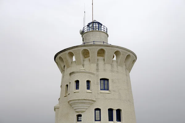 Deniz feneri ile pencere eşiği — Stok fotoğraf