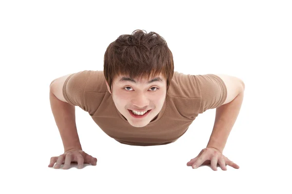 Smiling Young man make push-ups and fitness — Stock Photo, Image