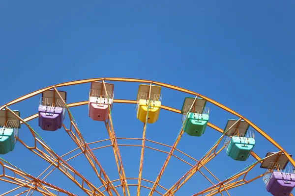 Ferris wheel and blue sky background — Stock Photo, Image