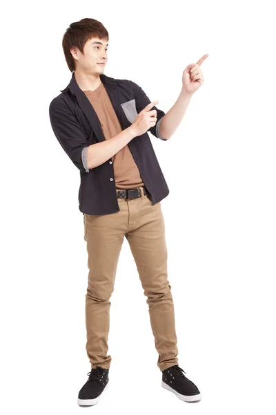 Asian young man pointing something — Stock Photo, Image