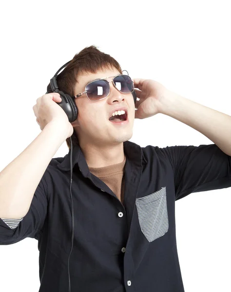 Portrait of young man with glasses and headphones isolated on white — Stock Photo, Image