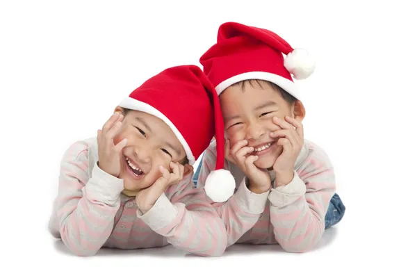 Dzieci Boże Narodzenie w santa kapelusz na białym tle — Zdjęcie stockowe