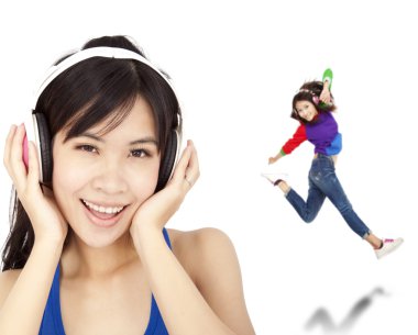 Happy asian woman listen music and dancing clipart