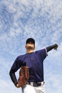 Baseball pitcher with cloud backgroung clipart