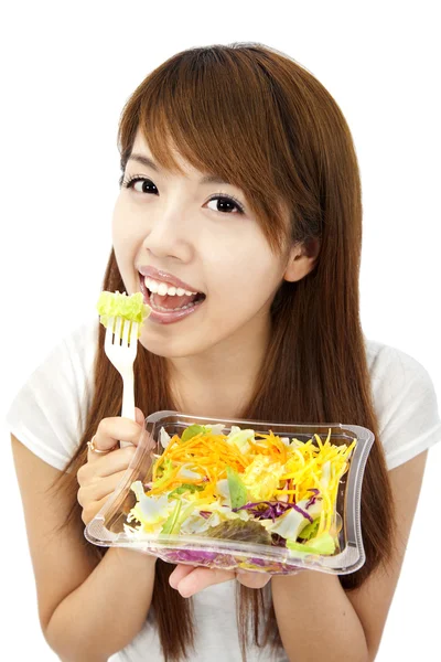 Ung asiatisk kvinna med grönsaker och sallad — Stockfoto