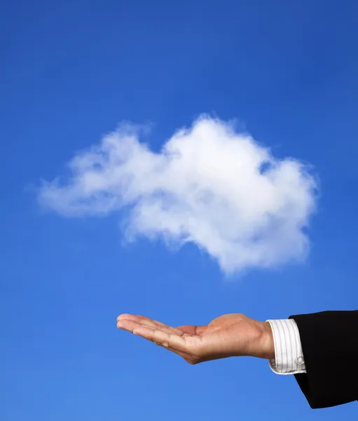 Cloud computing koncept. hand av affärsmannen hålla ett moln — Stockfoto