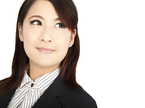 Розумна азіатська бізнес-леді дивиться на копійку — стокове фото