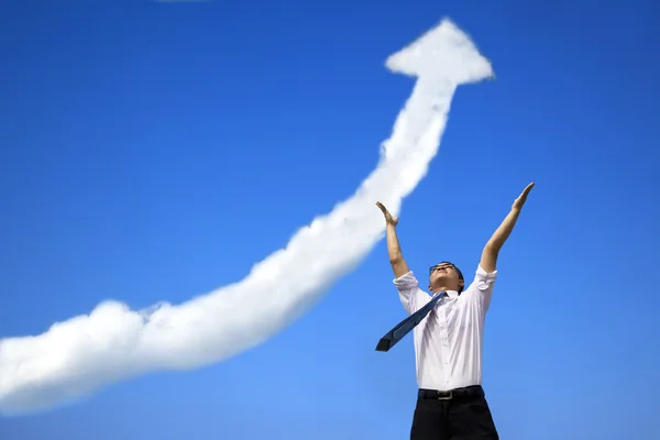 ビジネスの成長する雲のグラフの成功実業家 ストックフォト