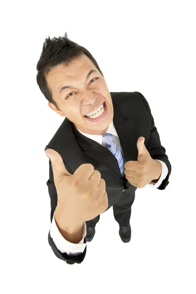 Happy asian businessman with thumbs up — Stock Photo, Image