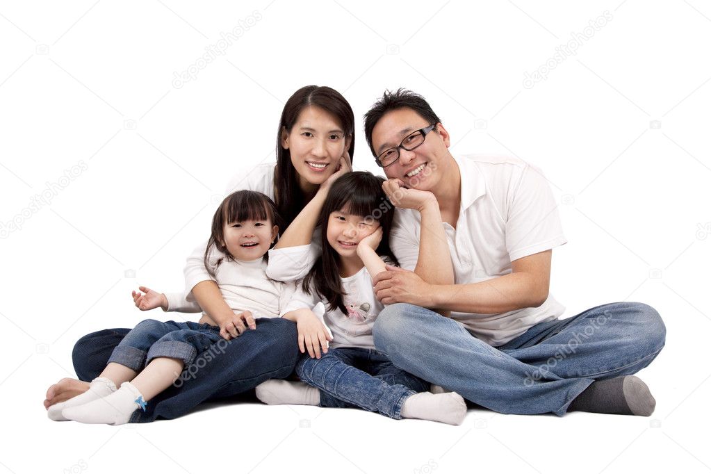Asian family isolated on white