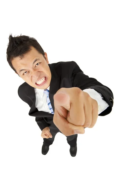 Angry asian young businessman pointing — Stock Photo, Image