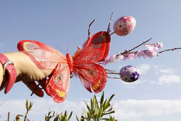 Butterfly with Easter eggs in the sky — Stock Photo, Image